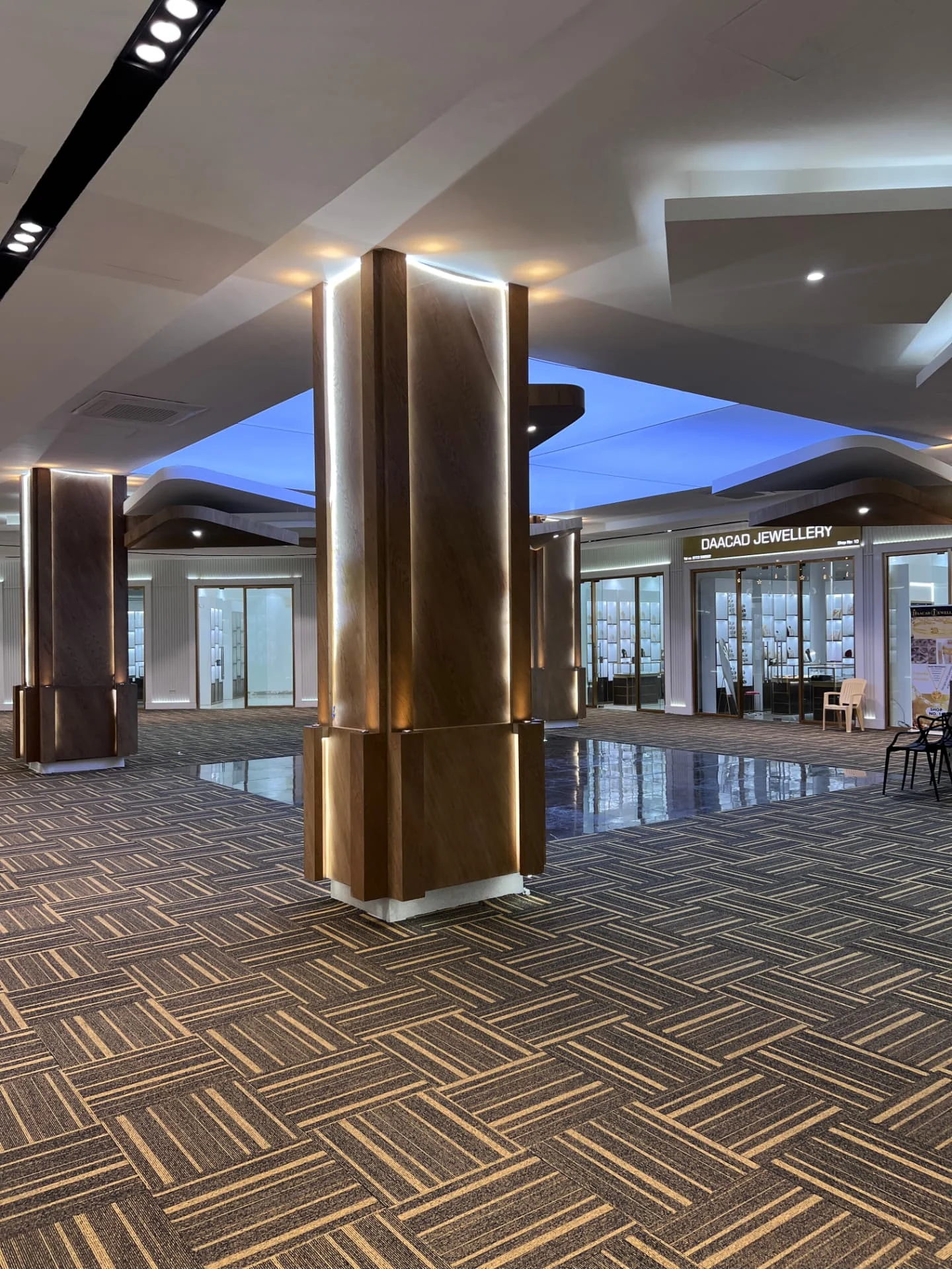 BBS Gold Souk, timber-clad columns with cove lighting