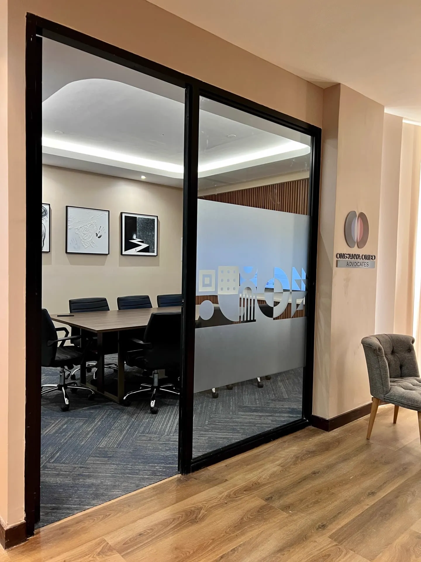 Boardroom viewed through frosted glass sliding doors