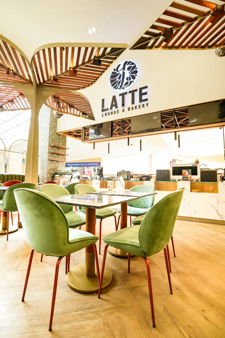 Hospitality lounge with sage seating and timber canopy