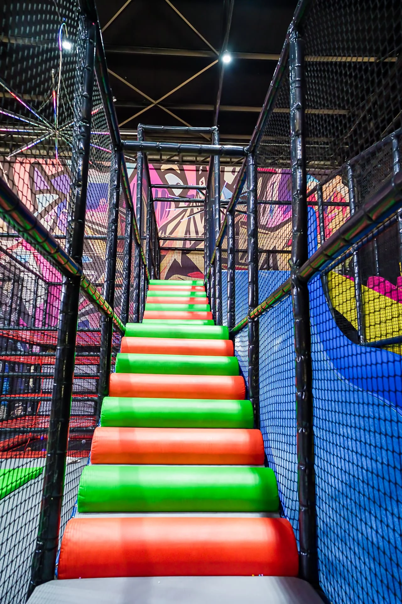 Padded climbing stairs inside the Star Jump play frame