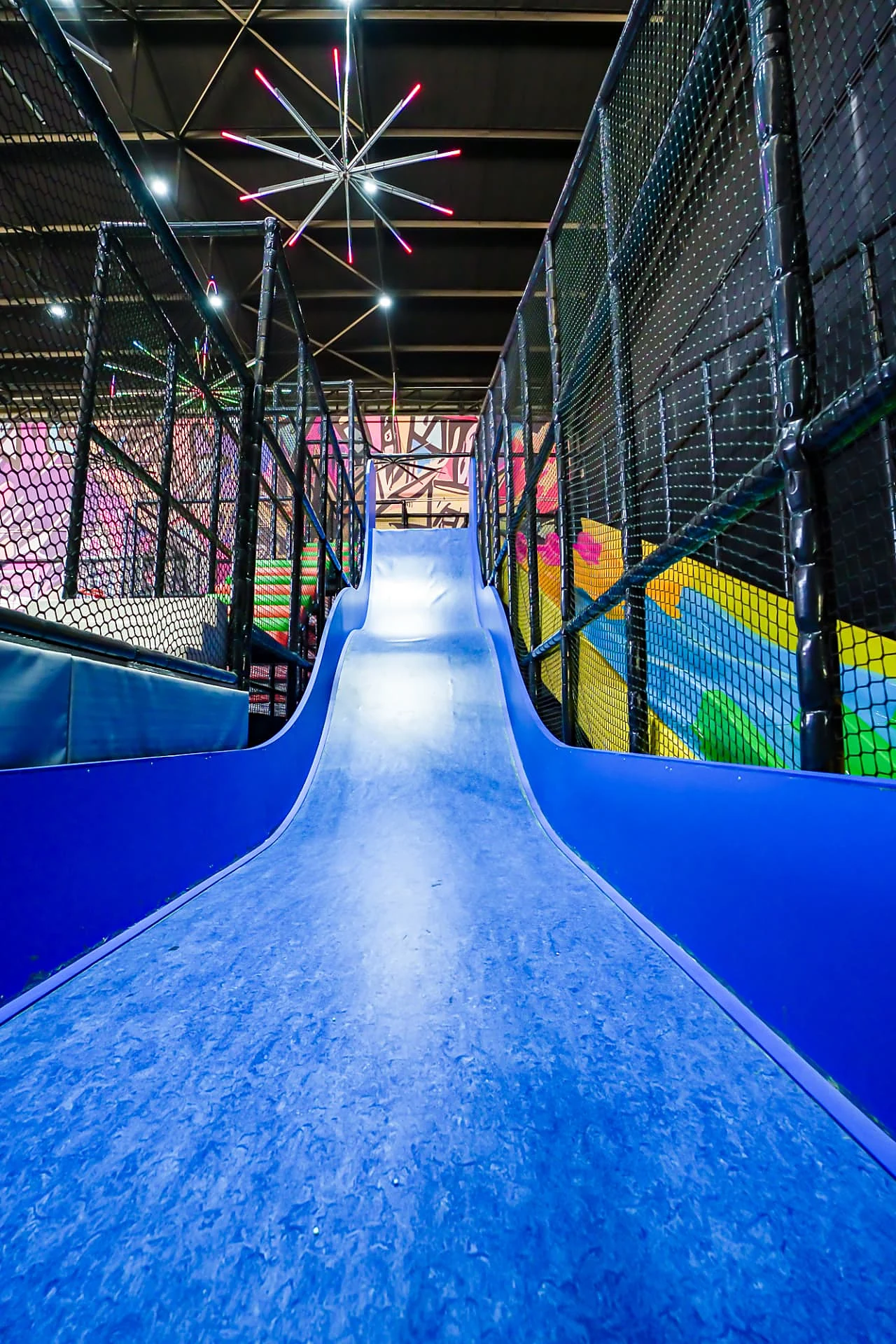 Blue drop slide viewed from the top platform